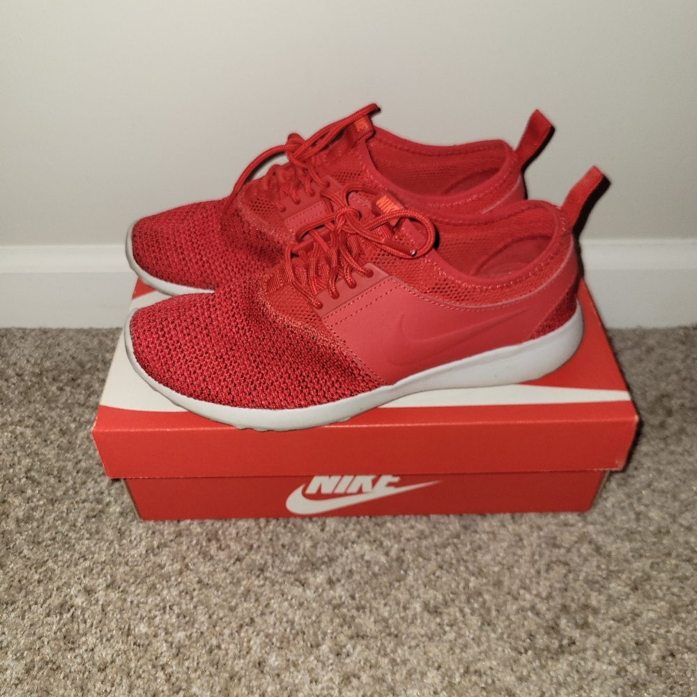 Womens red Nike running shoe 7.5